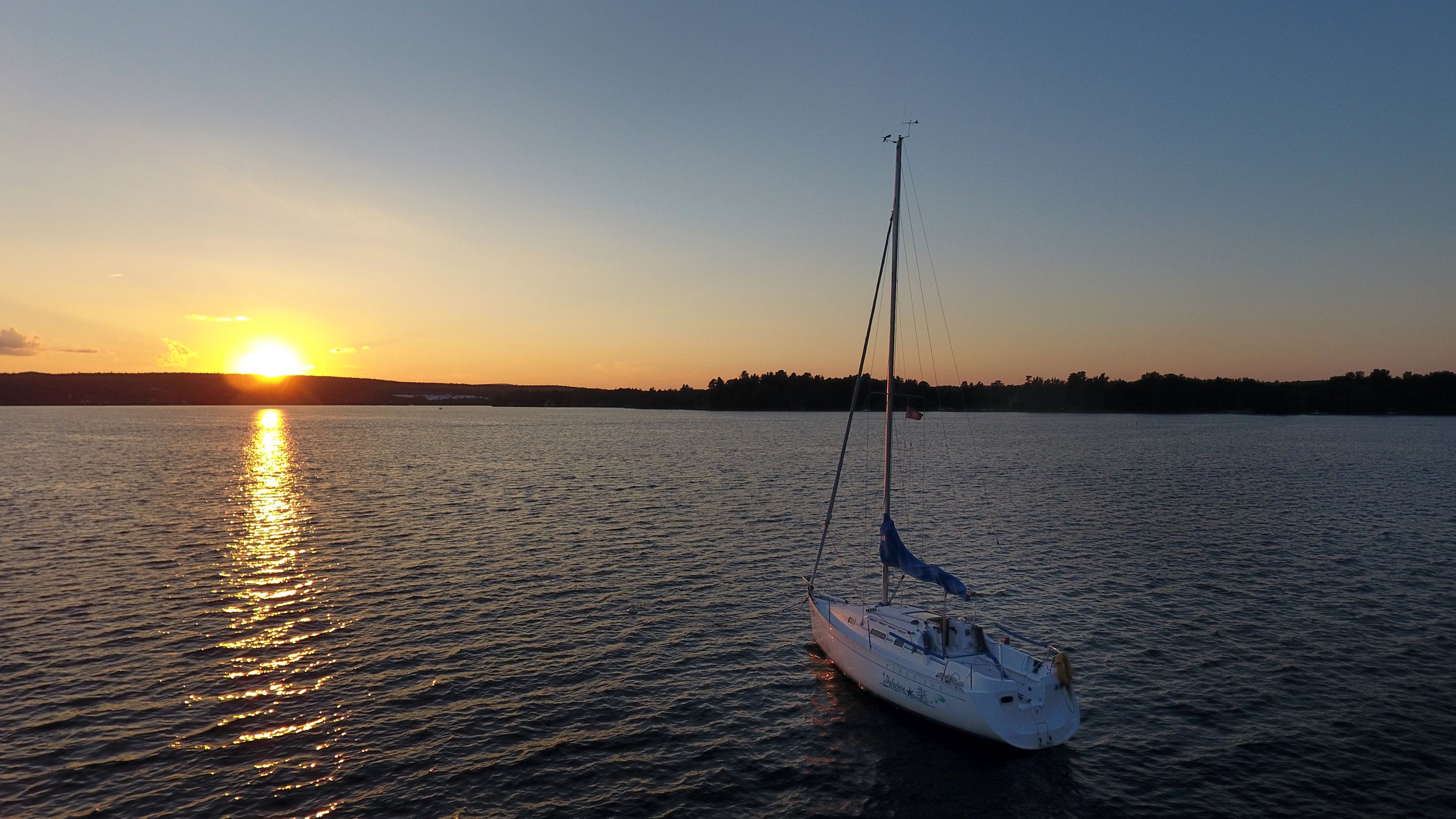 Sailboat photo at sunset